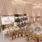 Flower Bar arranged in a clear glass vase