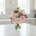 Hand-Tied Bouquet With Keira Garden Roses

A stunning hand-tied bouquet of one dozen Keira garden roses, loved for their romantic, vintage-inspired beauty. With full, ruffled blooms in soft blush-pink and creamy tones, Keira roses bring effortless elegance to any occasion.

12 premium Keira garden rose stems, farm-direct
Beautifully wrapped and ready to gift upon arrival
Includes flower food to help keep your roses fresh and vibrant
Care guide included with expert tips on handling and maintaining your Keira
