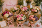 Flower bar events arranged in a clear glass vase