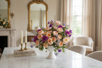 Garden Rose Arrangements arranged in a clear glass vase
